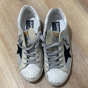 Golden Goose Cream and Black Star Sneakers